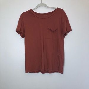 Rust orange short sleeve tee with pocket!
